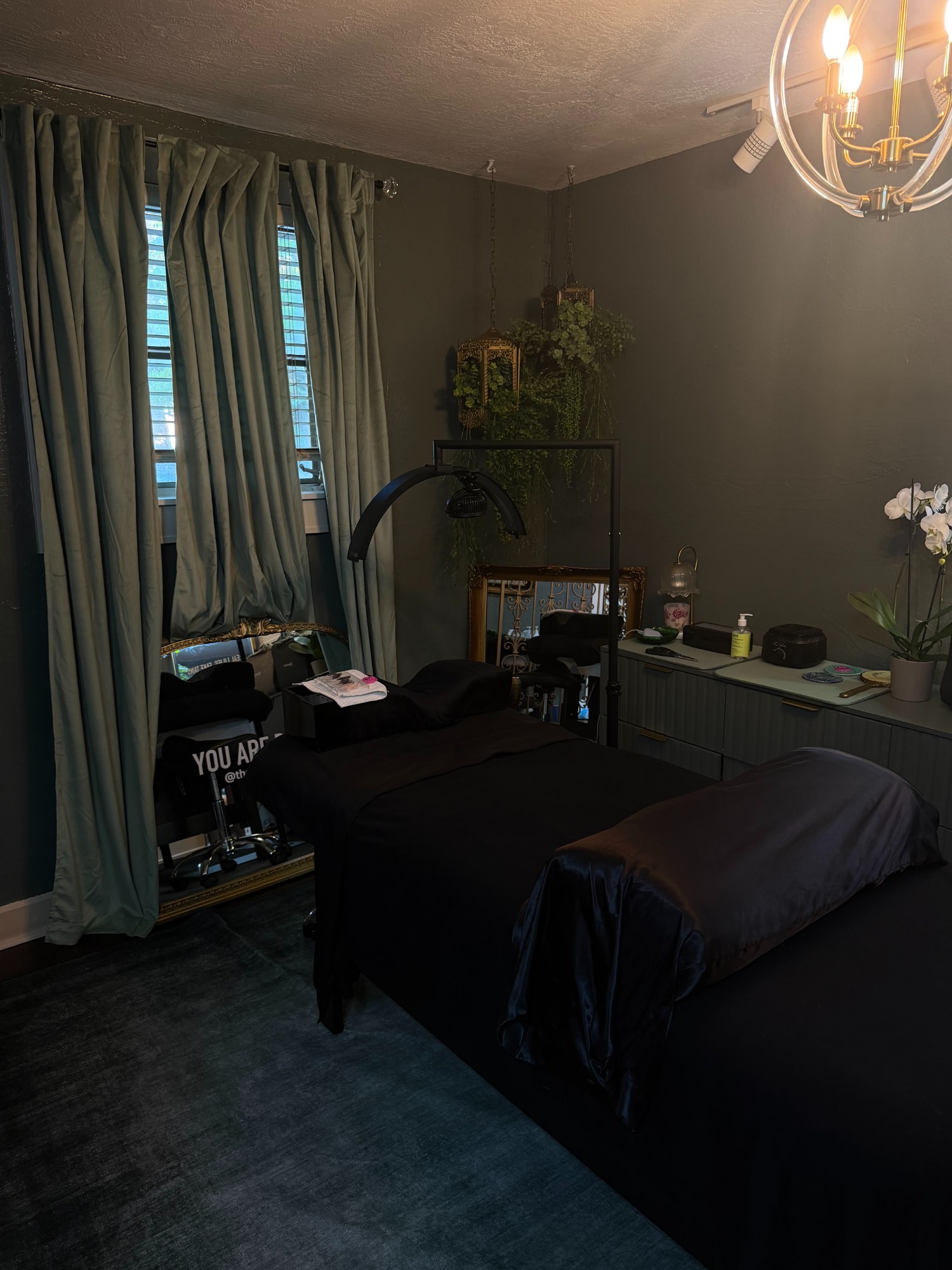 Halo lighting, candles & calm — The Bronze Lily, St. Petersburg, FL